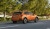 thumb-помаранчевий субару іксві їде по дорозі